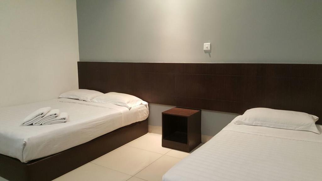 Tiong Nam Hotel Пасир Гуданг Екстериор снимка